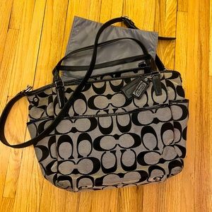Gently used Coach baby bag with changing pad.  Use as cross body or tote.